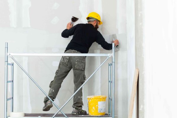 worker-plastering-gypsum-board-wall-2023-11-27-05-16-16-utc(1)